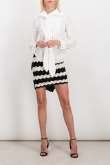 Asymmetric chevron knit mini skirt