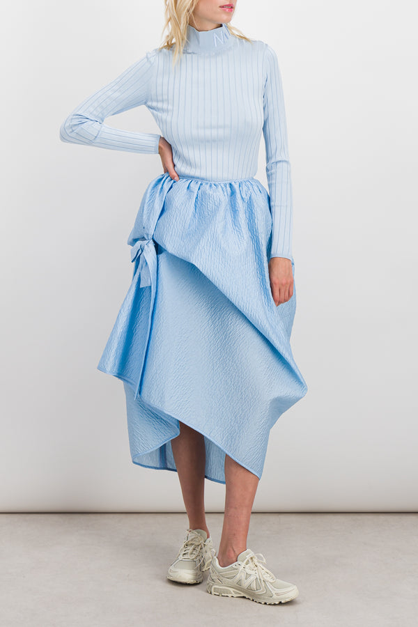 Matelassé voluminous asymmetrical skirt with bow detail