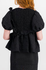 Blouse with smocked panels and ruffles